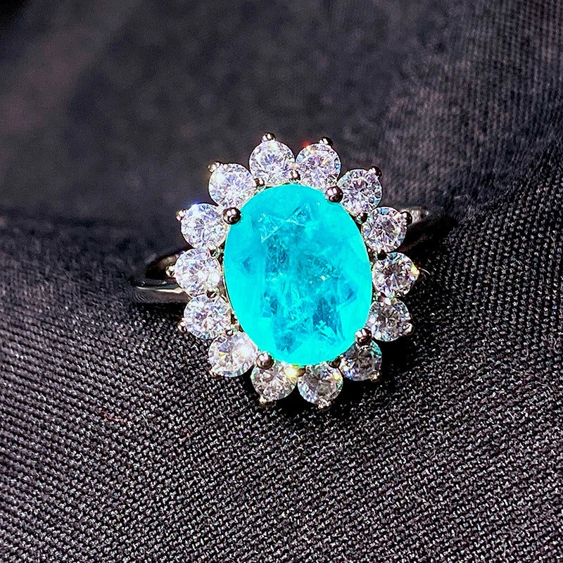 Beautiful Oval Cut Sunburst Halo Blue Paraiba Tourmaline/Ruby Engagement Ring For Her